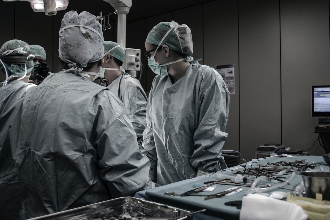 A surgical team working together in an operating room